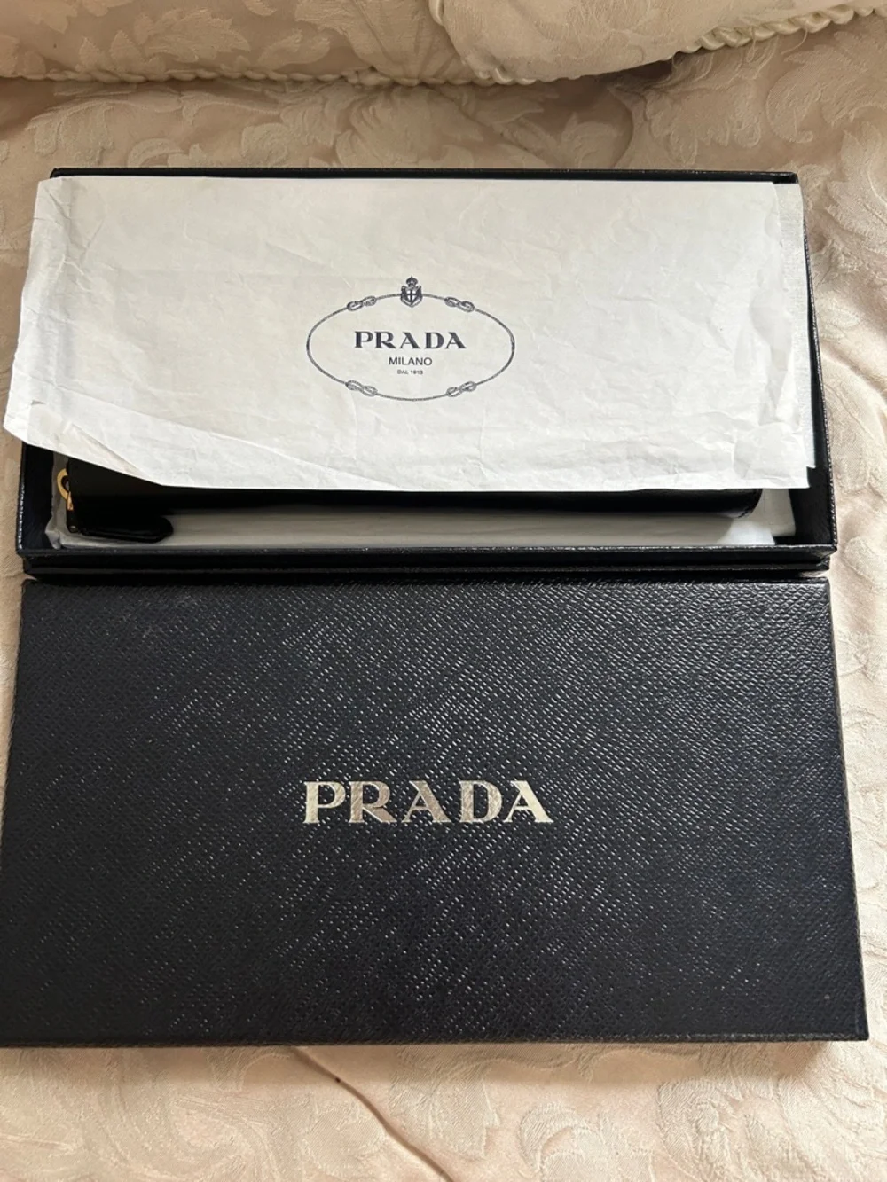 7013. Authentic Prada Black Leather Zip Wallet w/Turquoise Logo Detail & COA.